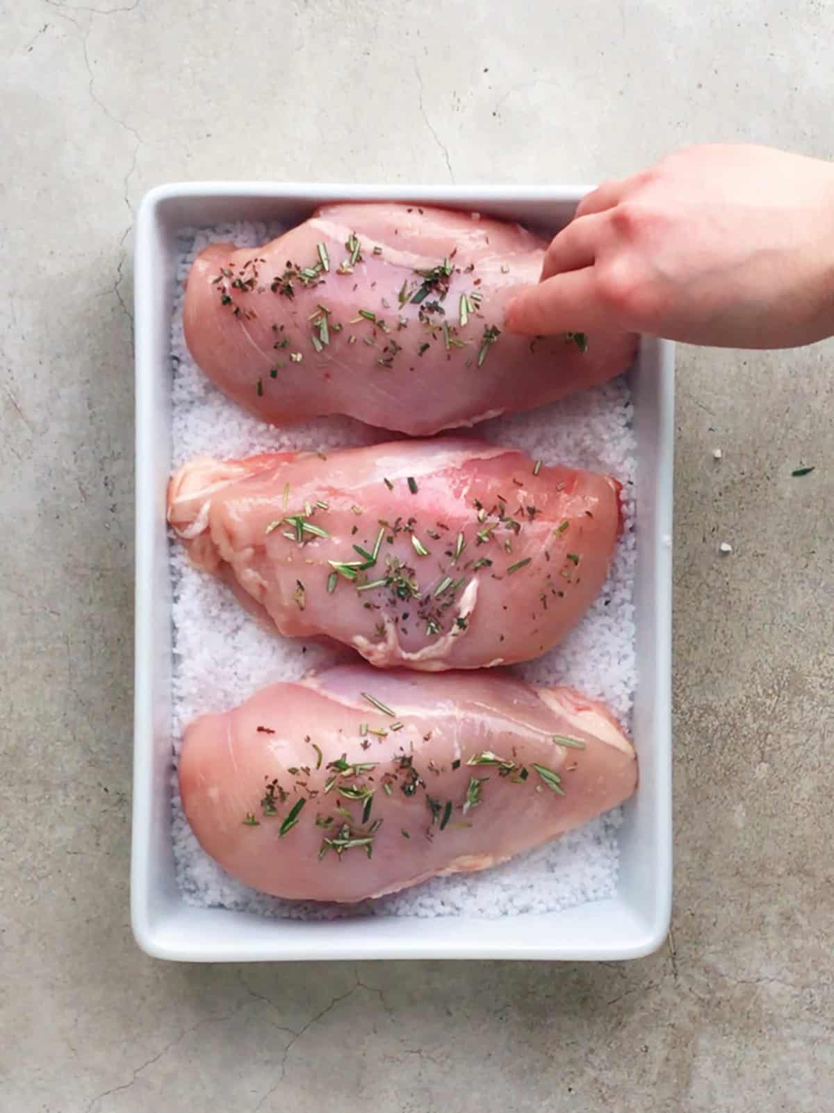 Chicken covered in salt